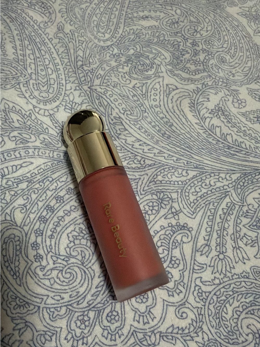 Rare Beauty Lip Product in Warm Peachy Coral